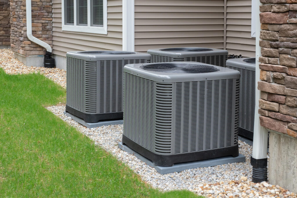 Residential HVAC units installed outside a home to provide consistent heating and cooling performance.